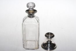 Silver collared decanter, London 1800, together with single silver dwarf candlestick (2).