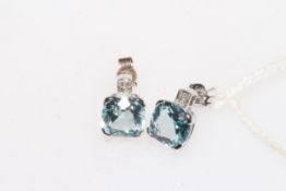 Pair blue topaz earrings set in 9 carat white gold.