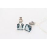 Pair blue topaz earrings set in 9 carat white gold.