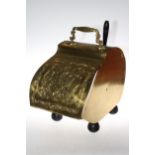 Brass coal scuttle with handle, 42cm high.