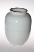 Chinese white glazed vase with foliage sgraffito decoration, 27cm.