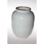 Chinese white glazed vase with foliage sgraffito decoration, 27cm.