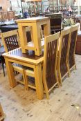 Barker & Stonehouse? light oak and walnut ten piece dovetail dining suite comprising two door