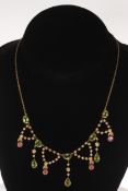 Peridot, seed pearl and pink stone elegant necklace in 9 carat gold.