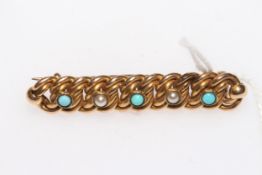 15 carat gold, turquoise and seed pearl twist form brooch, 4.25cm across.