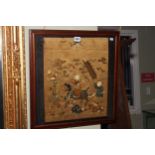 Framed Chinese silkwork depicting a Gentleman Riding a Dragon with Two Figures on Foot,