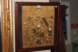 Framed Chinese silkwork depicting a Gentleman Riding a Dragon with Two Figures on Foot,