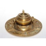 French 19th Century gilt desk inkwell with rope twist borders, 20cm diameter.