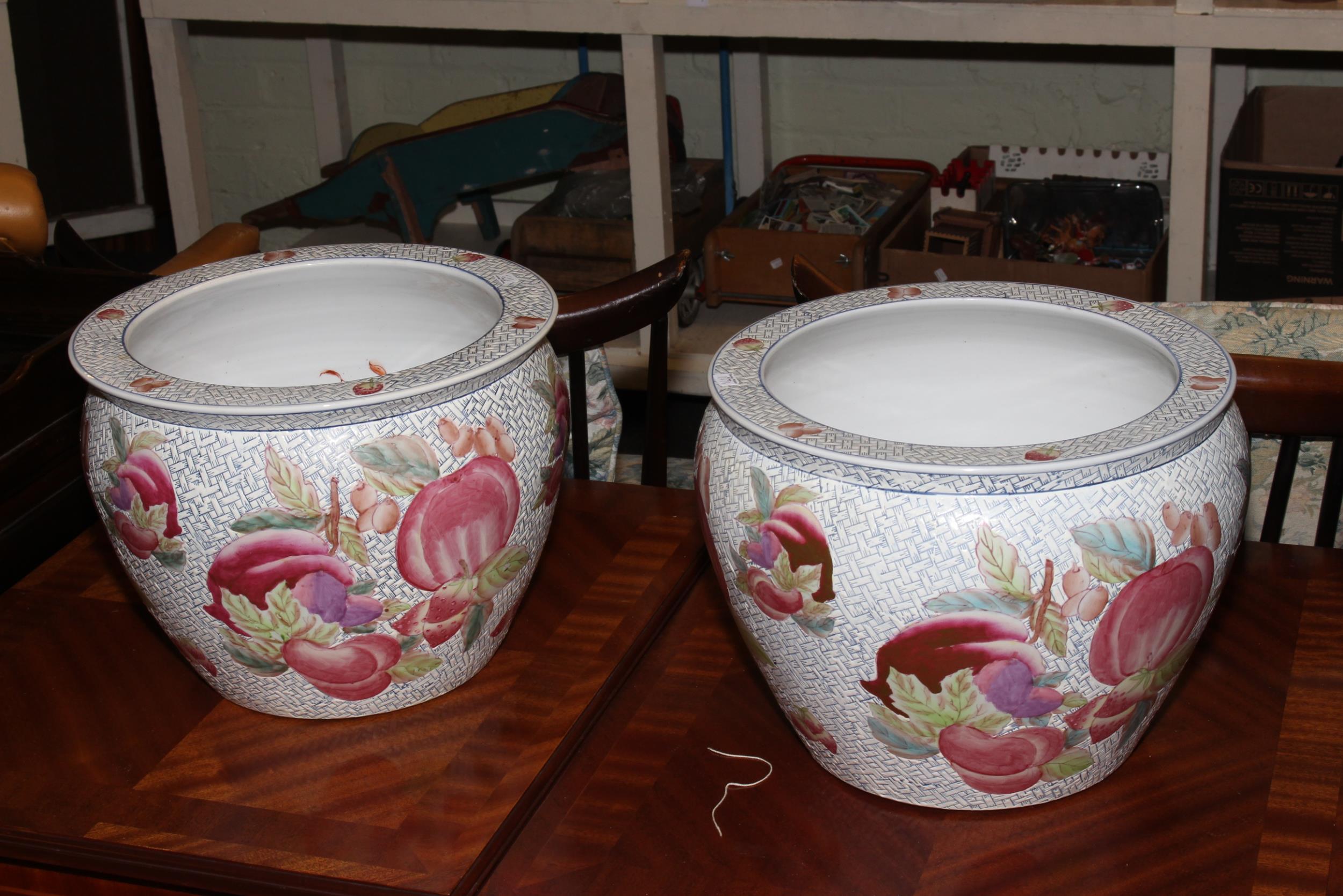 Pair of Oriental pottery fish bowls.