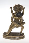 Tibetan erotic bronze figure of Yamantaka, naked male and female with headdress, 38cm.