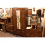 Early 20th Century oak mirror door three piece bedroom suite and double bedstead.