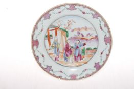 Chinese famille rose plate decorated with figures in exterior scene, 23cm diameter.