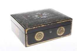 Victorian papier-mache dressing table box, with fitted interior with toilet bottles, 28cm wide.