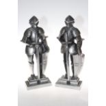 Pair of white metal standing knights, 43cm high.