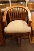 Hardwood swivel desk chair.