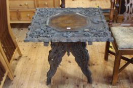 Oriental relief carved foliate and leaf occasional table with octagonal centre,