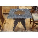 Oriental relief carved foliate and leaf occasional table with octagonal centre,