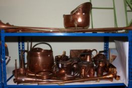 Collection of copper wares including coal scuttle and bucket, kettles, horns, watering cans, etc.