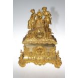 19th Century decorative ormolu mantel clock, the circular dial with gallant and maiden figures,