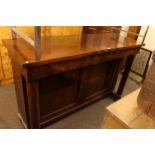 Victorian mahogany table leaf cabinet having hinged lid and side door, 97cm by 156cm by 53cm.