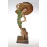 Art Deco painted plaster figure of bather with sombrero, 45cm.