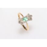 18 carat gold and platinum, emerald and eight stone diamond ring, size S/T.
