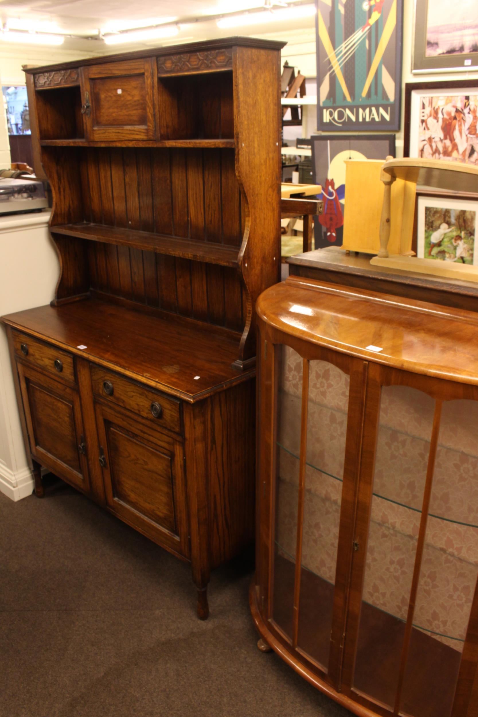 1920's/30's oak shelf back dresser and walnut bow front two door china cabinet.