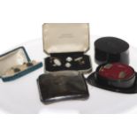 Silver cigarette case, collar studs and cufflinks and novelty top hat box.