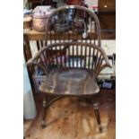 Windsor spoke back elbow chair with crinoline stretcher.