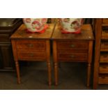 Pair Continental two drawer pedestals on turned reeded tapering legs,