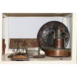 Adjustable brass fender, brass jardiniere, copper pans, kettle, circular plaque, wall hooks,