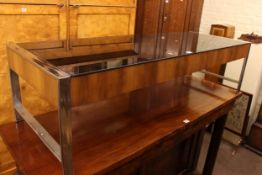 Rectangular tinted glass, chrome and teak coffee table, 38.5cm by 142cm by 51cm.