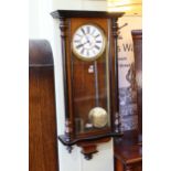 Victorian walnut and ebonised double weight wall clock.