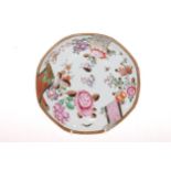 Chinese famille rose octagonal dish, having flower decoration and scroll and gilt border,