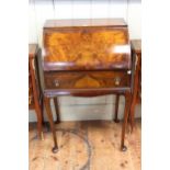 Ladies walnut writing bureau on cabriole legs, 99cm by 59.5cm by 44cm.