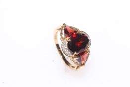 9 carat gold, garnet and diamond ring, size N/O.