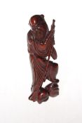 Carved wood Oriental figure of a sage.