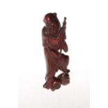 Carved wood Oriental figure of a sage.