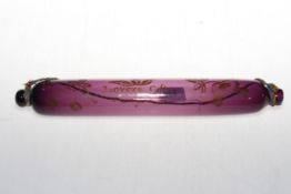 19th Century amethyst glass 'Lovers Gift' rolling pin, 37cm long.