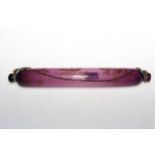 19th Century amethyst glass 'Lovers Gift' rolling pin, 37cm long.