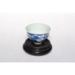 Chinese blue and white tea bowl with six character mark, 7.5cm diameter, with stand.