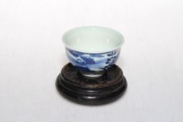 Chinese blue and white tea bowl with six character mark, 7.5cm diameter, with stand.