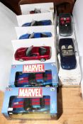 Six Revell model sports cars and two Marvel Captain America Corvettes.