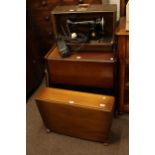 Ercol drop leaf coffee table, drop leaf trolley, SInger sewing machine and accessories.