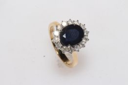 Sapphire and diamond 18 carat gold cluster ring,