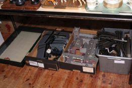 Three boxes of railway accessories including controllers, track, buildings, Bachmann display case,