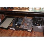 Three boxes of railway accessories including controllers, track, buildings, Bachmann display case,