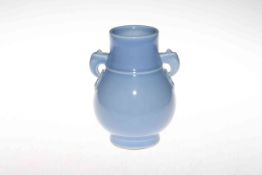 Chinese blue glazed two handled vase, seal mark to base, 16.5cm.