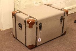 Little used fabric and leather bound trunk, 37cm by 69cm by 43cm.