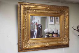 Good heavy gilt framed rectangular wall mirror, 127cm by 102cm.